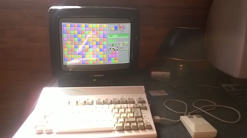 [ESTIMATION] Amiga 600 en loose + lot d'une centaine de disquettes.. 0XO53