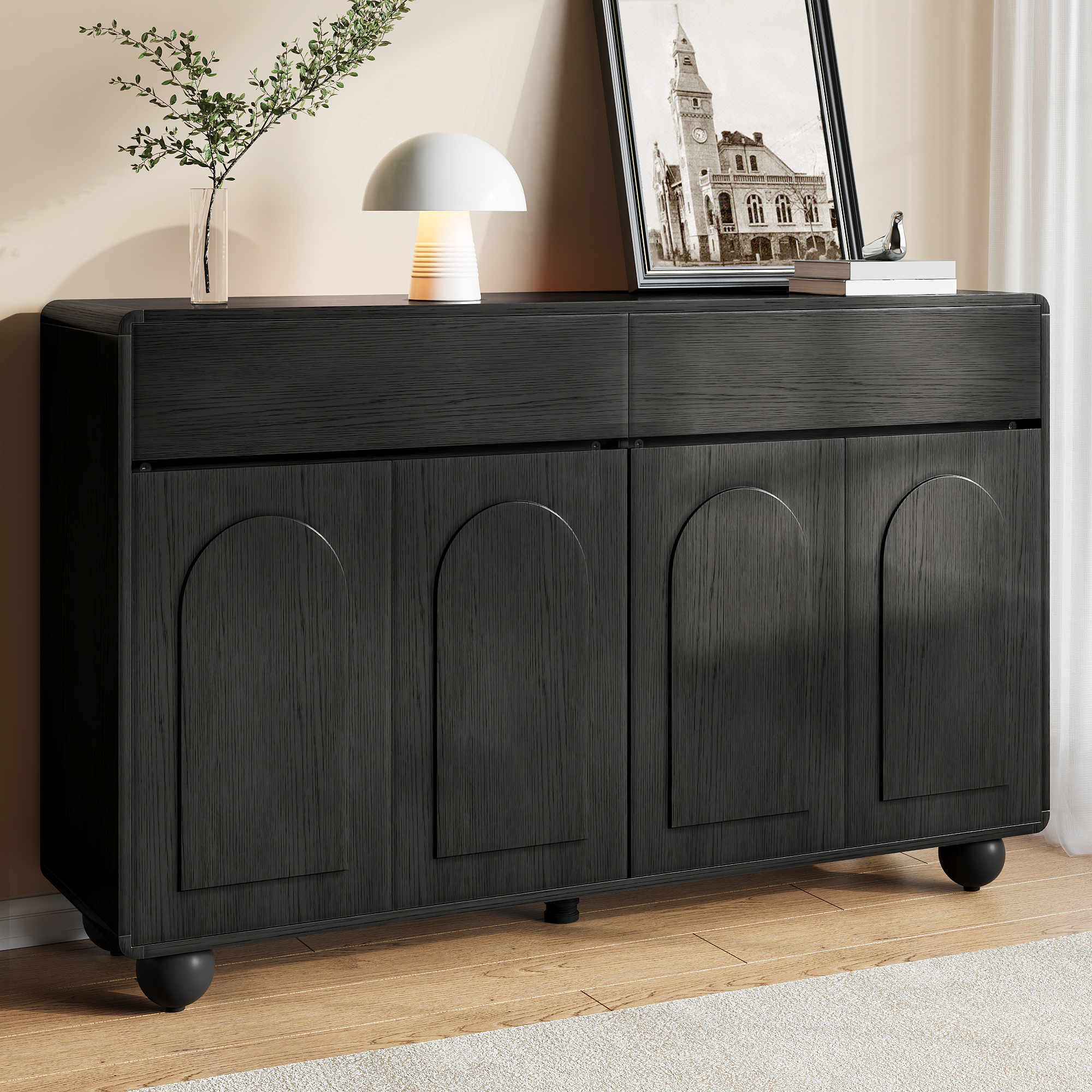 Buffet noir avec quatre portes à motif arqué et lignes arrondies
