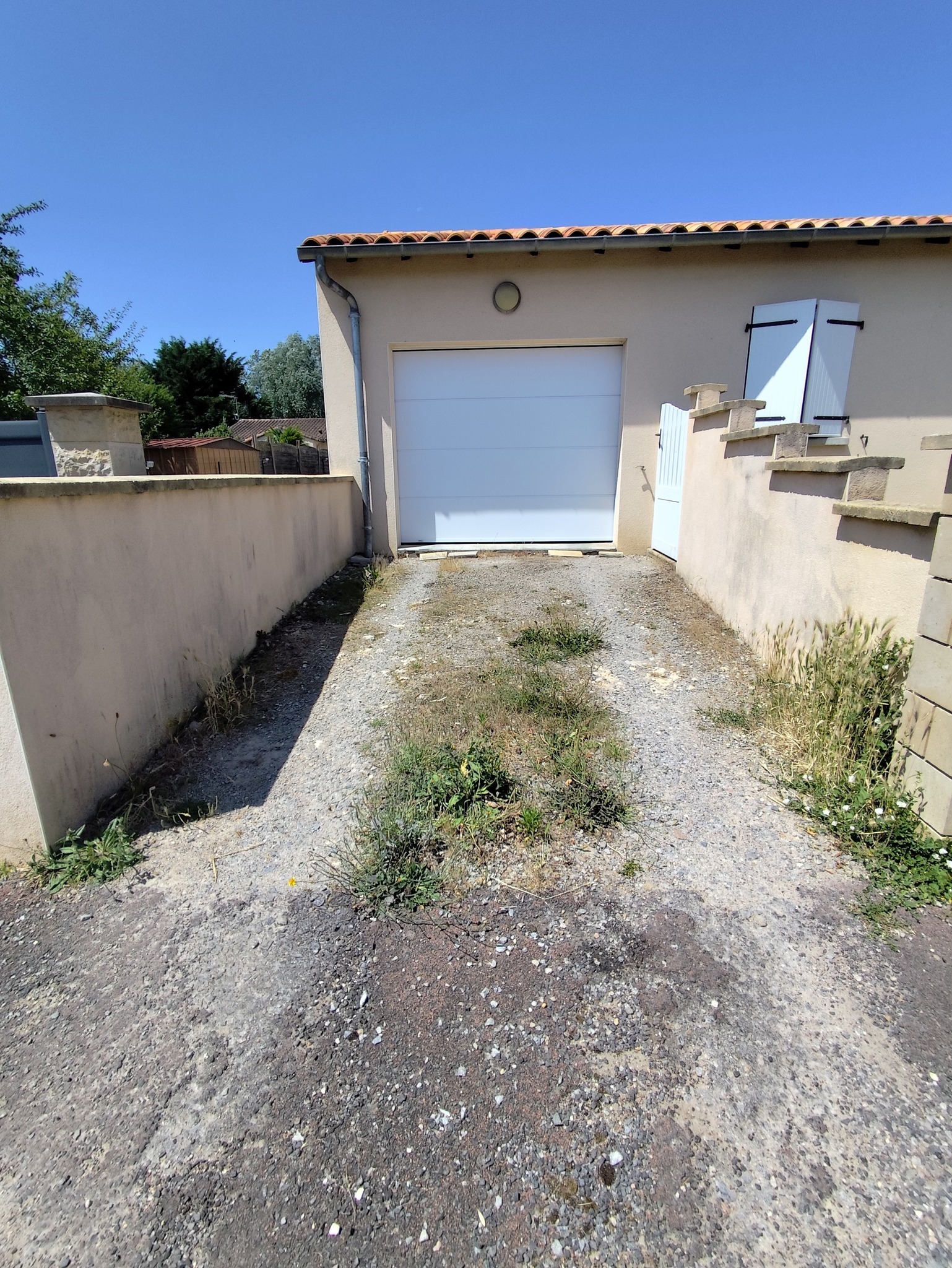 Entrée de garage en béton désactivé - Avant